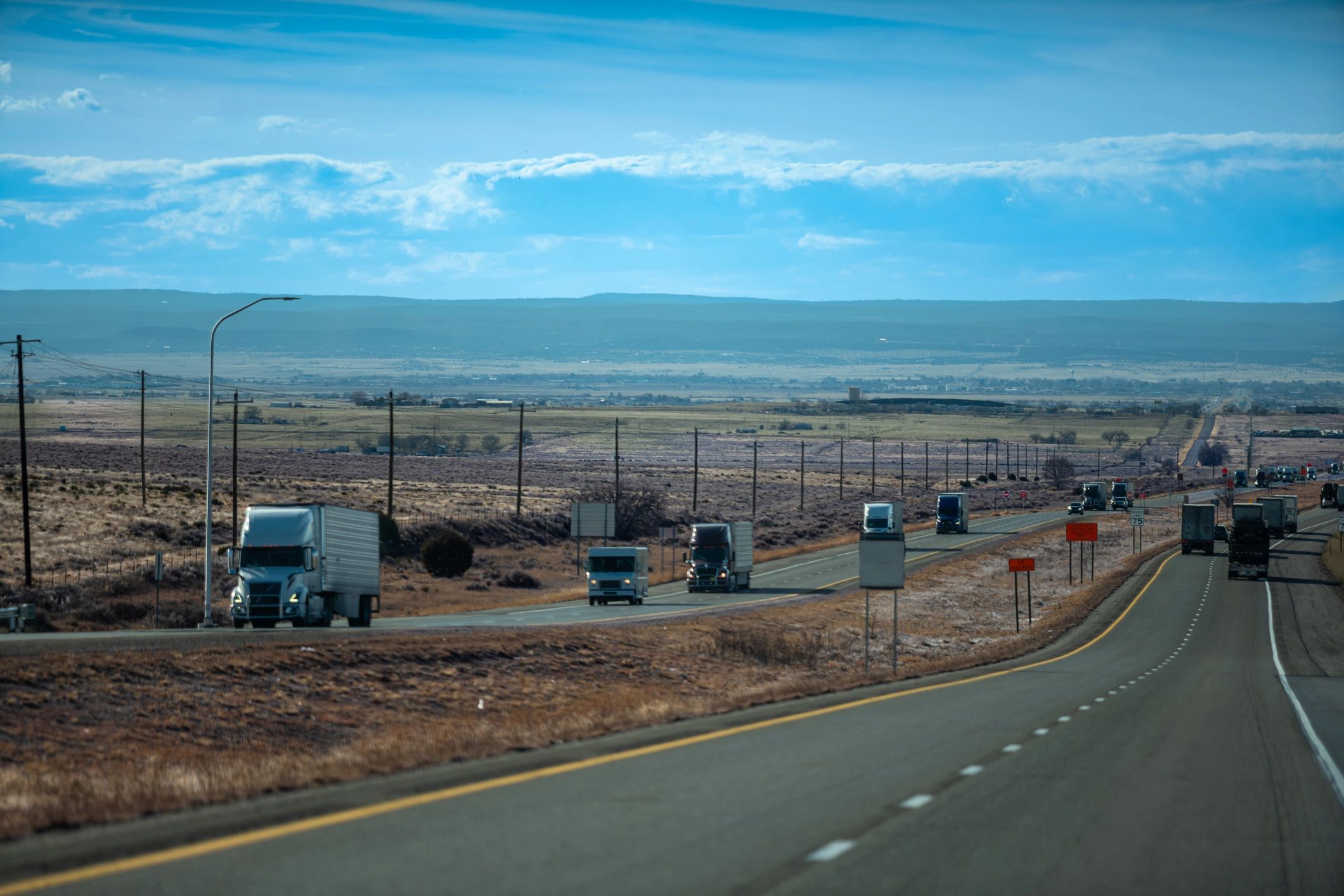 Specialized trucks and trailers staged for freight operations